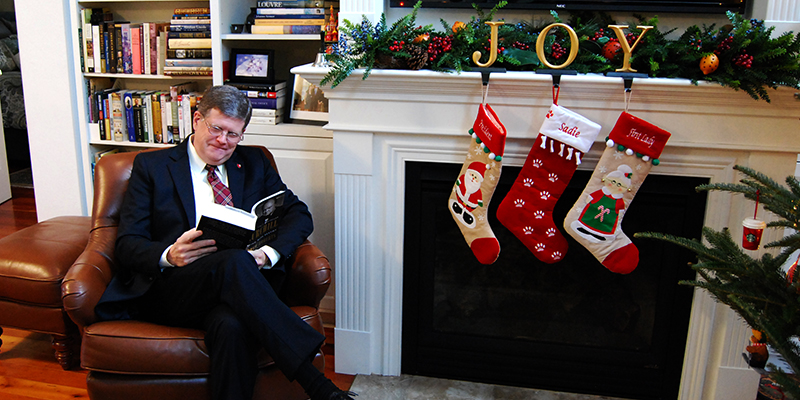 Faculty making a list, because reading is nice