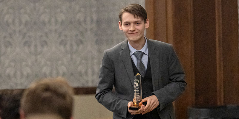 Debater Carnley earns All-American status, team closes season